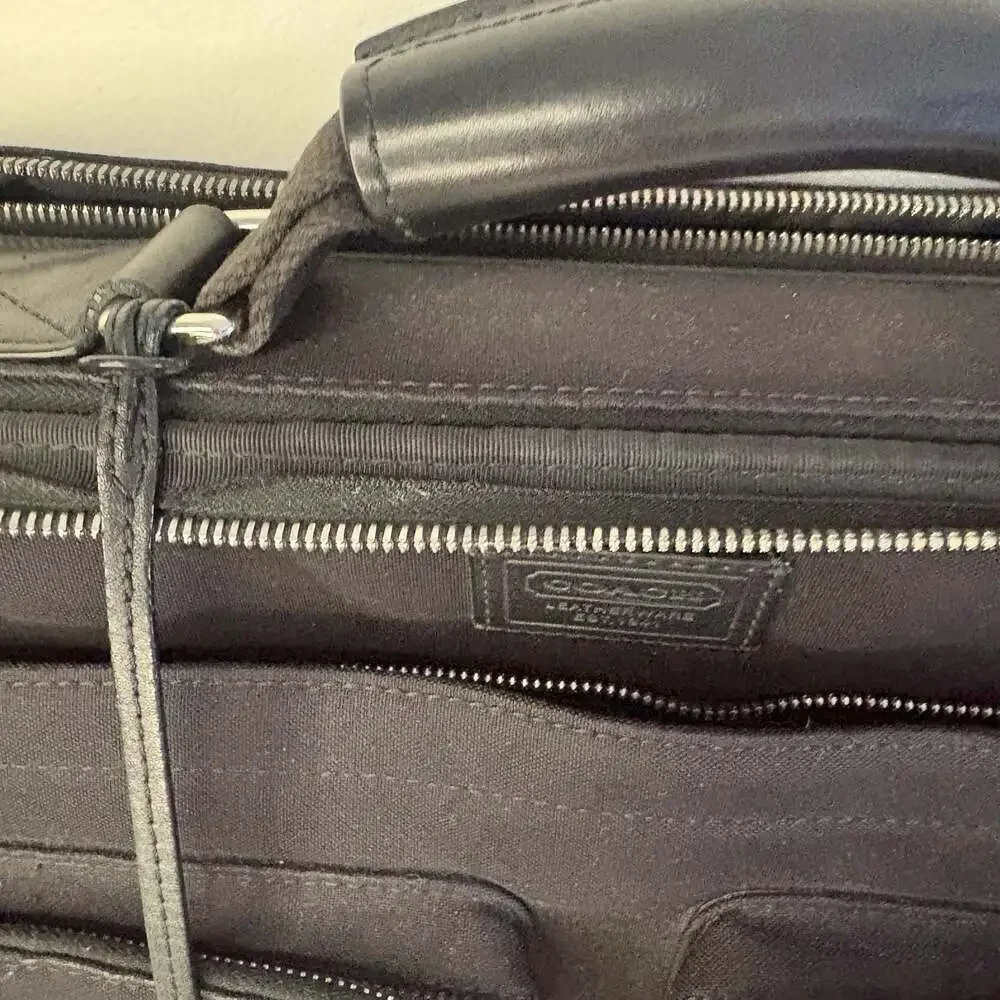 Coach leatherware along edges